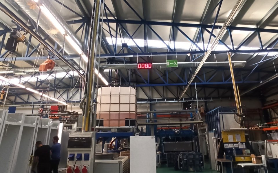 Industrial counter LED display in a factory of refrigerators